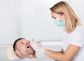 Man receiving dental checkup