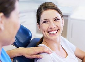 Smiling woman in a dental chair