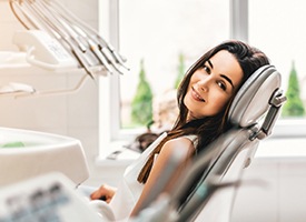 Smiling woman in dental chair