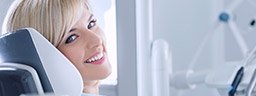 Smiling woman in dental chair